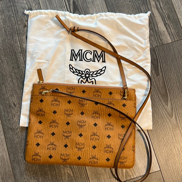 MCM Handbags - NWT MCM pocketbook with dust cover